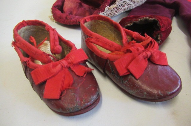 A set of Victorian Dolls clothing originally from a 28" Jumeau doll Image