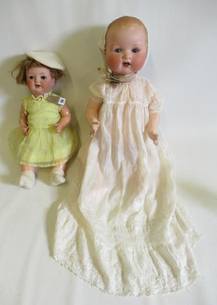 Two Armand Marseille bisque socket head character dolls Image