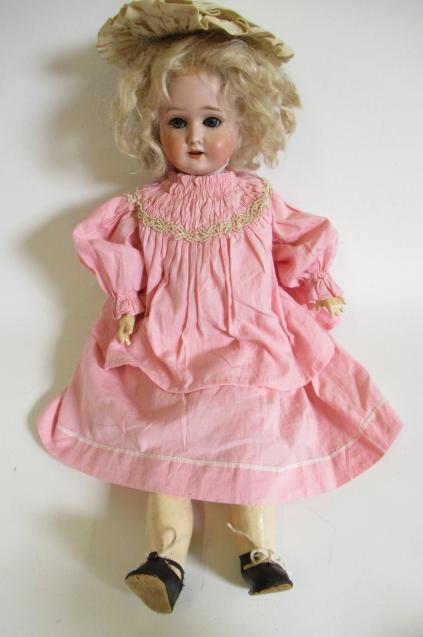 A Schoenau & Hoffmeister bisque socket head doll Image