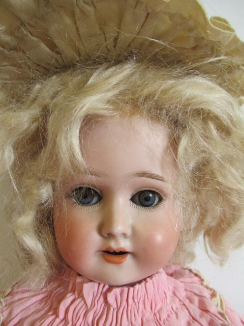 A Schoenau & Hoffmeister bisque socket head doll Image
