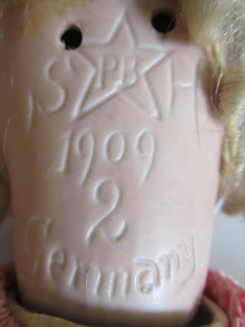 A Schoenau & Hoffmeister bisque socket head doll Image