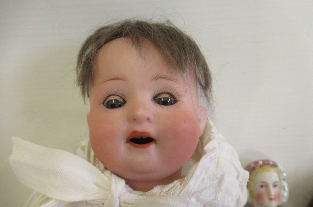 Four small dolls Image