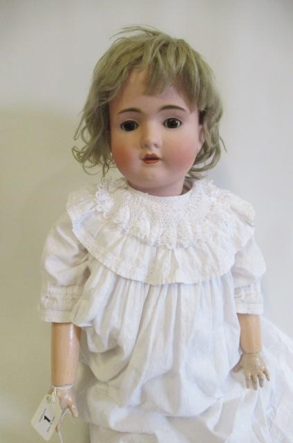 Bisque socket head doll Image