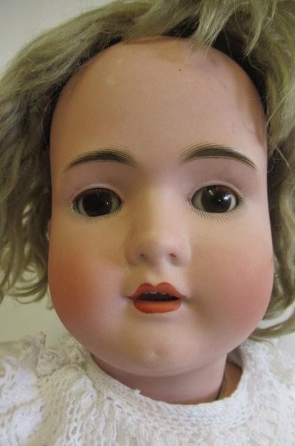 Bisque socket head doll Image