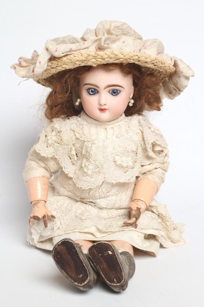 A Bebe Jumeau bisque socket head doll Image