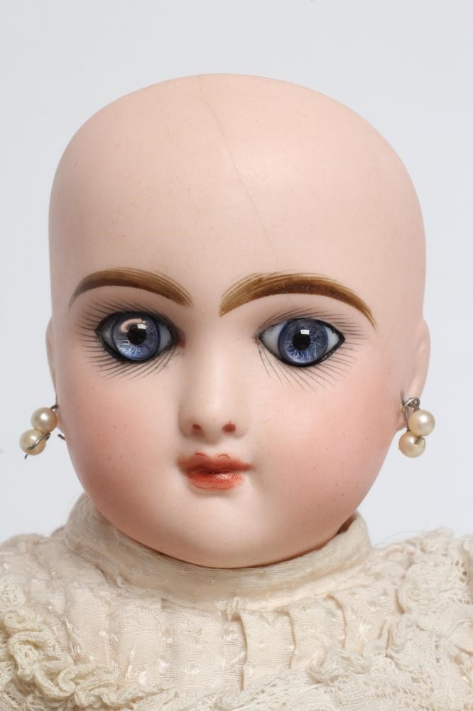 A Bebe Jumeau bisque socket head doll Image