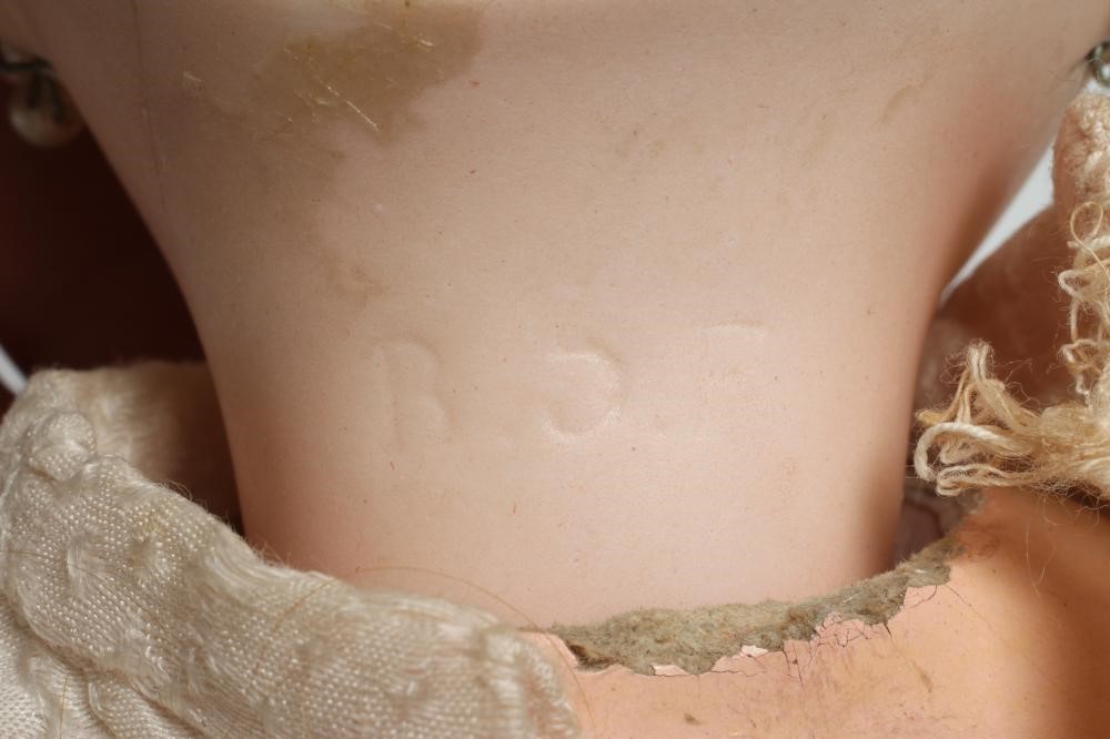 A Bebe Jumeau bisque socket head doll Image