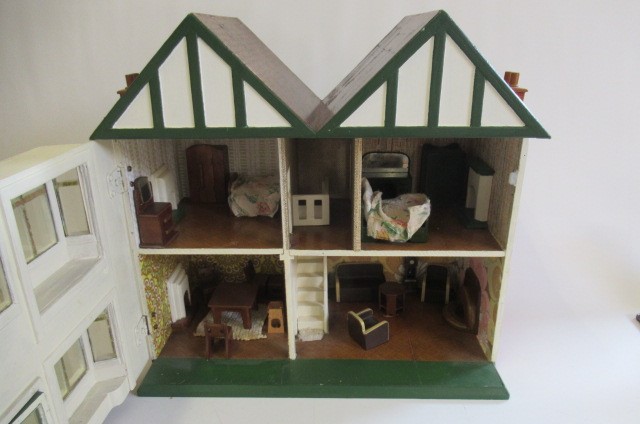 A scratch built doll's house and contents Image