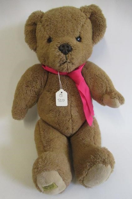 Two Merrythought bears comprising a boxed Freddie Fisher and a 23" jointed brown bear Image