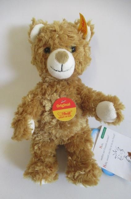 Seven collector's teddies Image