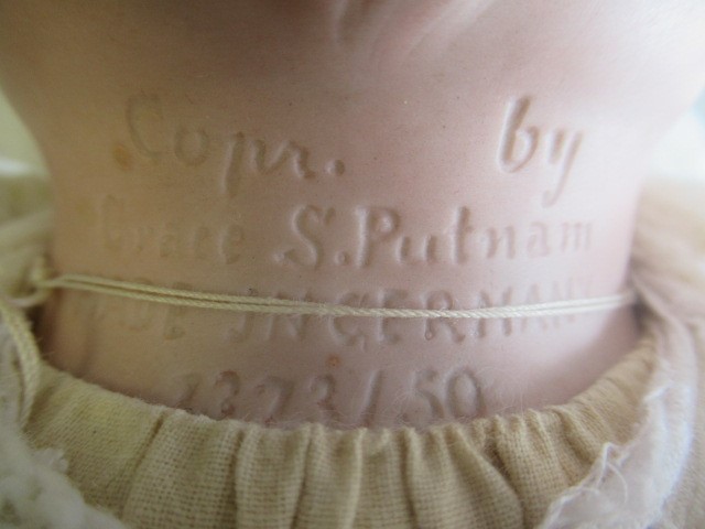 A Grace Putnam flange neck doll Image