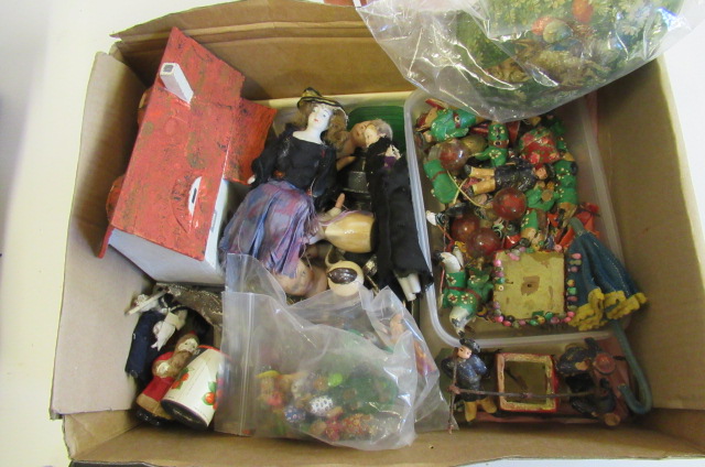 A collection of miniature figures and dolls accessories Image