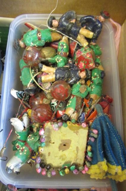 A collection of miniature figures and dolls accessories Image