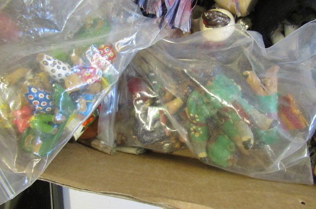 A collection of miniature figures and dolls accessories Image