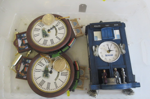 Three novelty clocks comprising Dr Who and two railway clocks Image