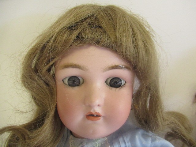 Two bisque head dolls Image