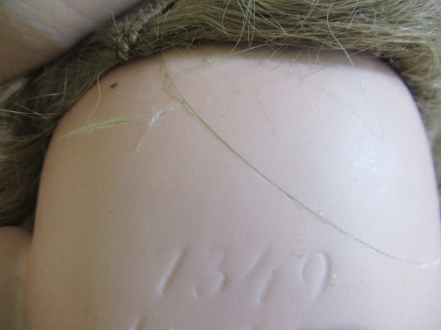 Two bisque head dolls Image