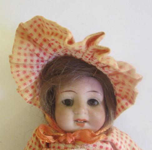 An all bisque miniature mignonette dolls house doll Image