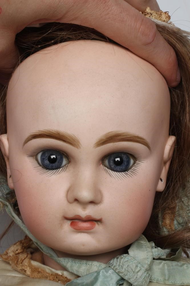 A Tete Jumeau bisque socket head doll Image