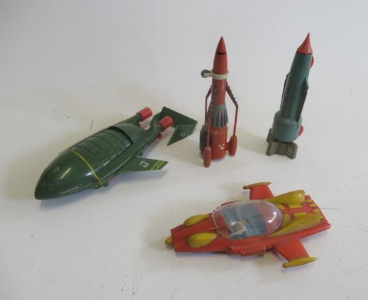TV21 toys comprising friction powered Thunderbird 3 (one wheel missing) Image