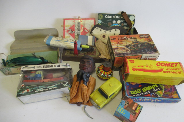 Toys and games from the 1960's including Sutcliffe clockwork boat Image