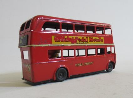 Minic clockwork London transport bus finished in red with Putney 14 destination sign Image