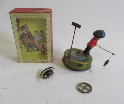 A Mettoy clockwork fishing boy Image