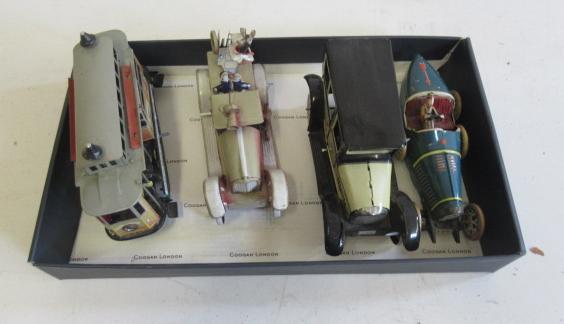 Late issue clockwork tinplate vehicles comprising fire engine Image