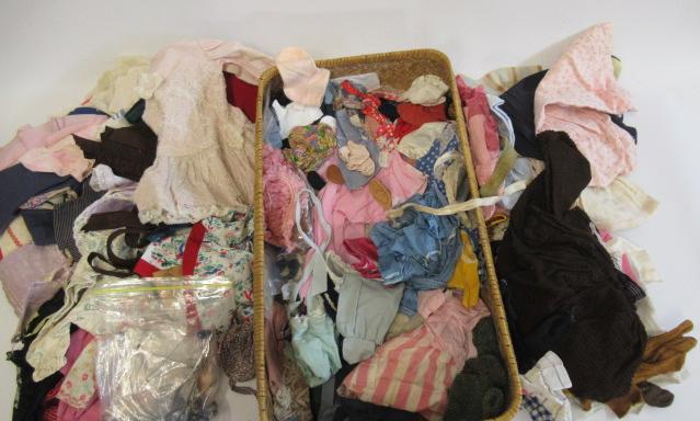 A quantity of dolls clothing and accessories Image
