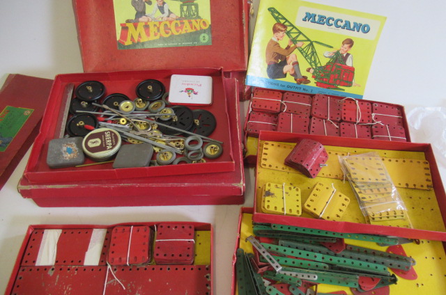 Playworn mostly red/green Meccano parts in 1950 red boxes Image