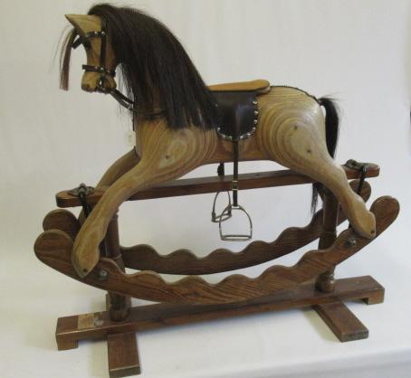 An Ian Armstrong rocking horse of carved laminate form Image