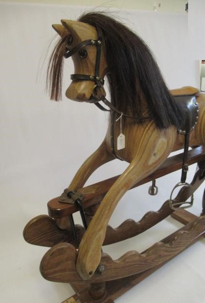 An Ian Armstrong rocking horse of carved laminate form Image