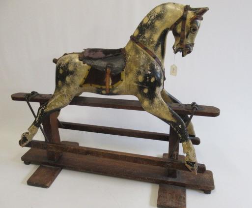 An antique rocking horse Image