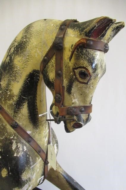 An antique rocking horse Image