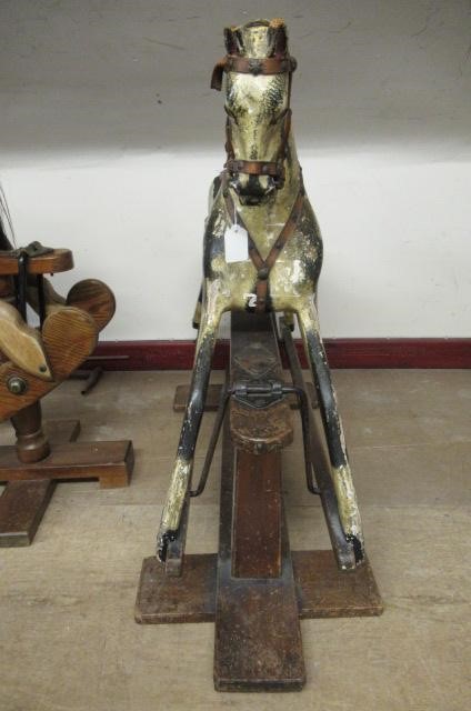 An antique rocking horse Image