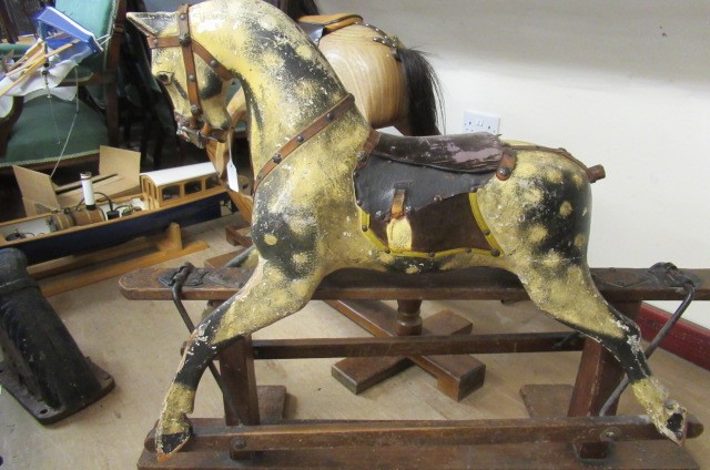 An antique rocking horse Image