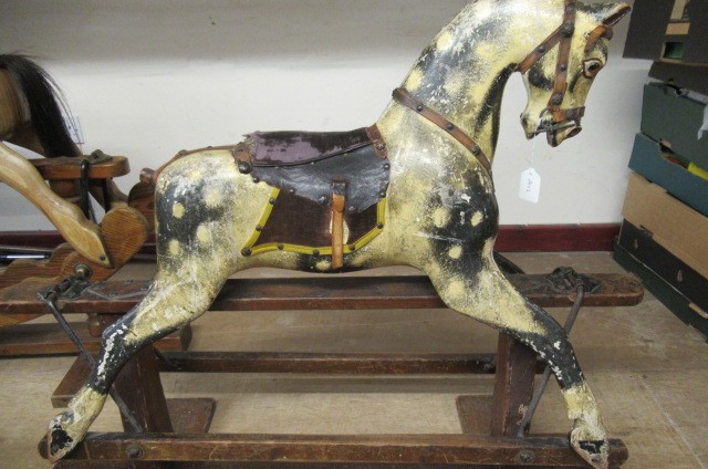 An antique rocking horse Image