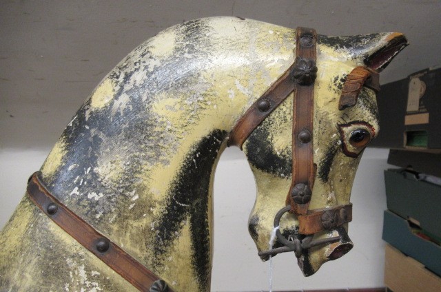 An antique rocking horse Image