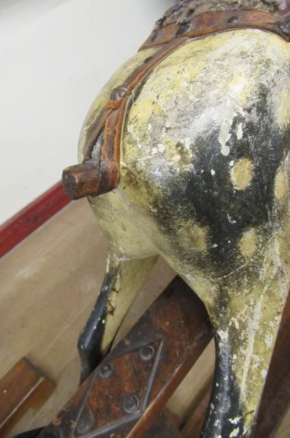 An antique rocking horse Image