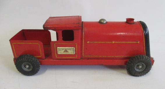 Triang toys push-a-long locomotive finished in red with rubber wheels Image