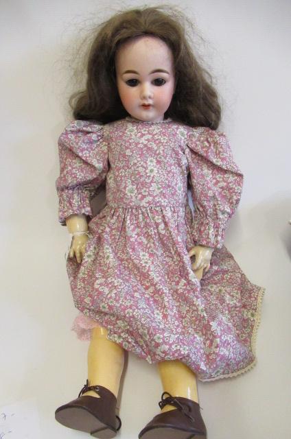 An Armand Marseille bisque socket head doll Image