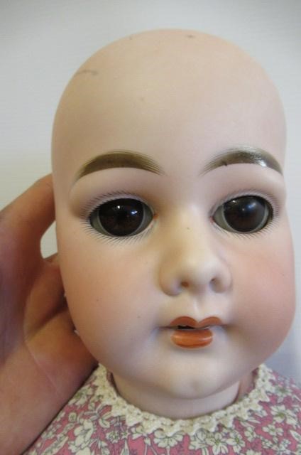 An Armand Marseille bisque socket head doll Image