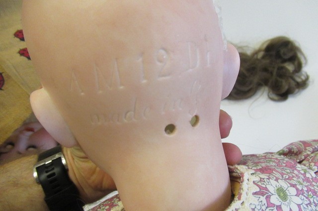 An Armand Marseille bisque socket head doll Image