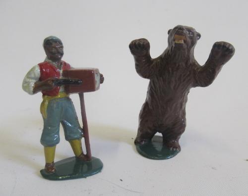 Timpo gypsy organ grinder and dancing bear Image