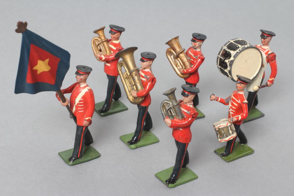 Britains Salvation Army band with six musicians and flag bearer finished in red uniforms Image