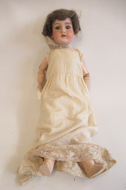 An Armand Marseille bisque socket head doll Image