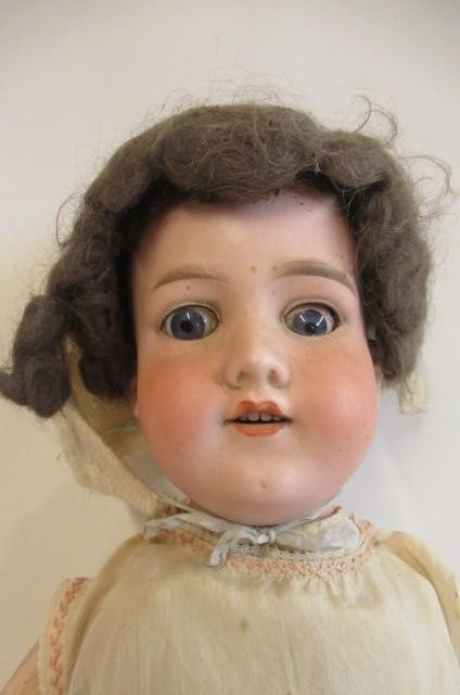 An Armand Marseille bisque socket head doll Image