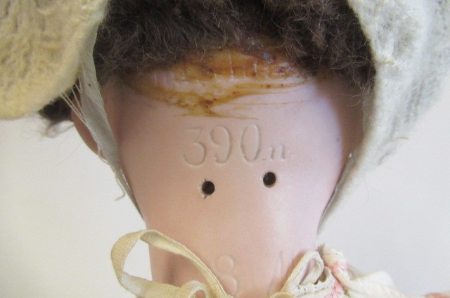 An Armand Marseille bisque socket head doll Image