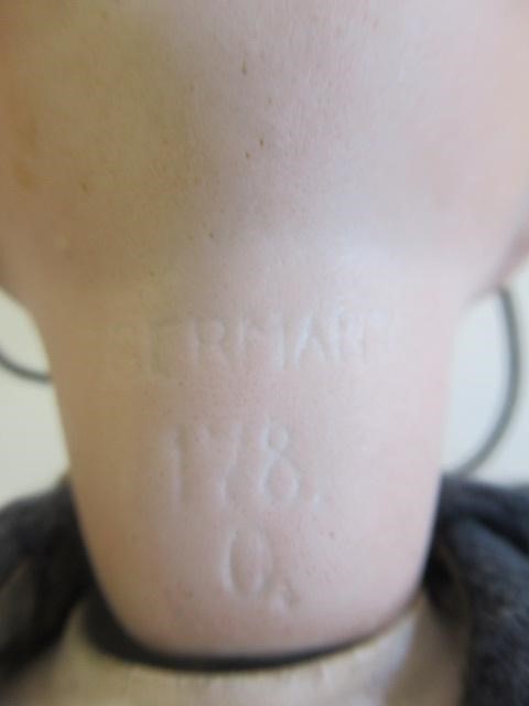 A Heubach bisque head solemn boy Image