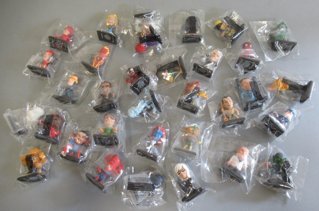 Thirty three Corinthian Marvel Super Hero figures Image